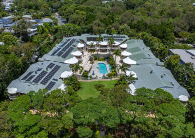 Aerial view of Serenity Apartments Noosa accommodation showing central pool and lush tropical surroundings